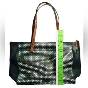 A black & brown Fossil Rachel top zipper closure tote bag.